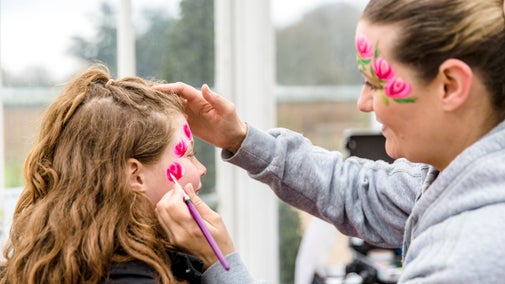 Face painting during the Festival of Blossom at Clumber Park, Nottinghamshire